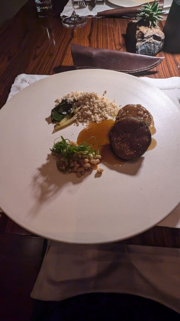 a plate of food on a napkin