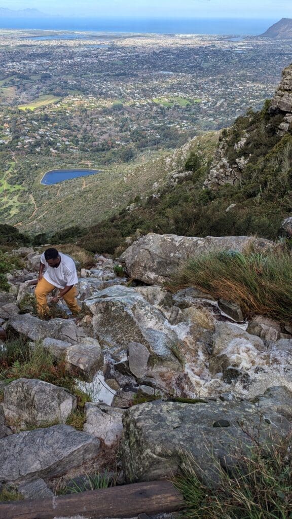 a man standing on rocks