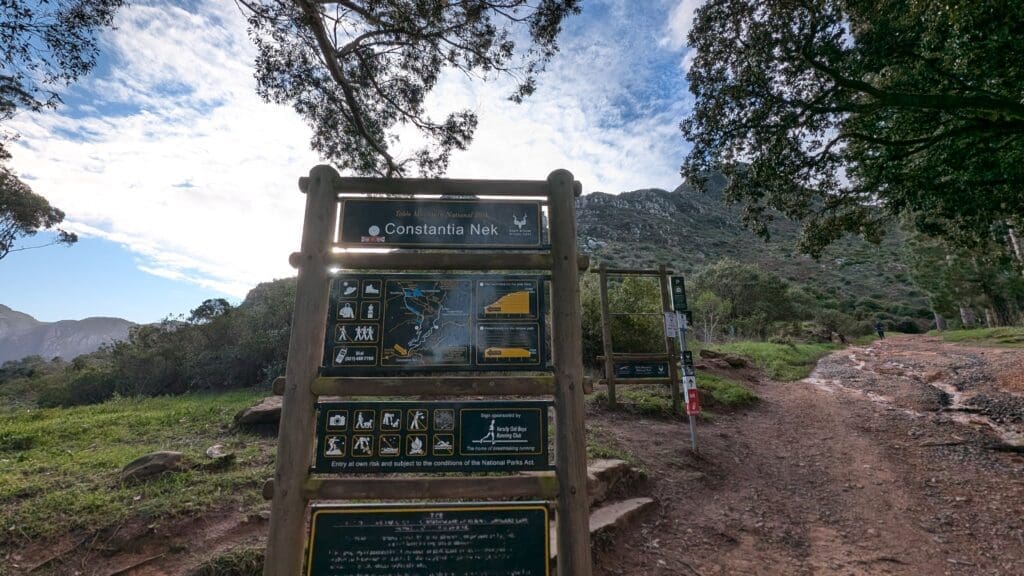 a sign on a trail