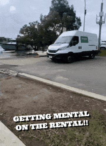 a white van parked in a parking lot