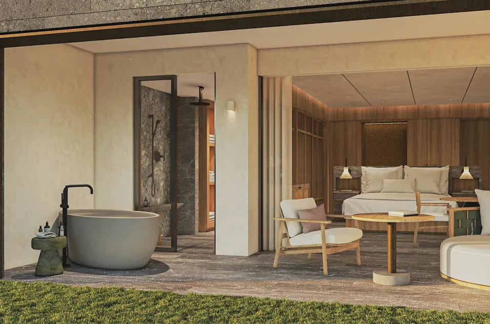 a hotel room with a tub and a table