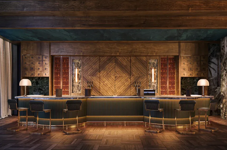 a bar with chairs in a room
