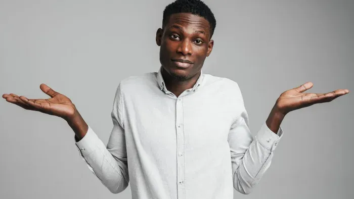 a man with his hands up
