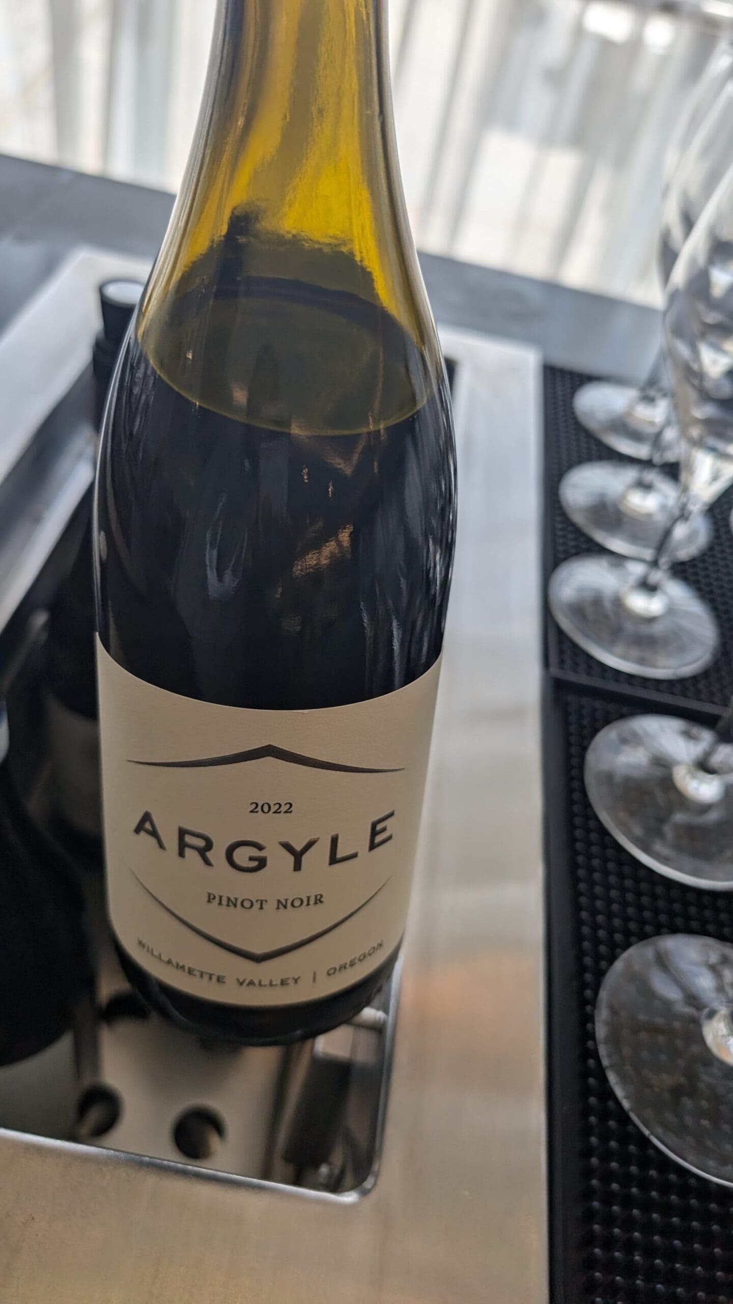 a bottle of wine on a table