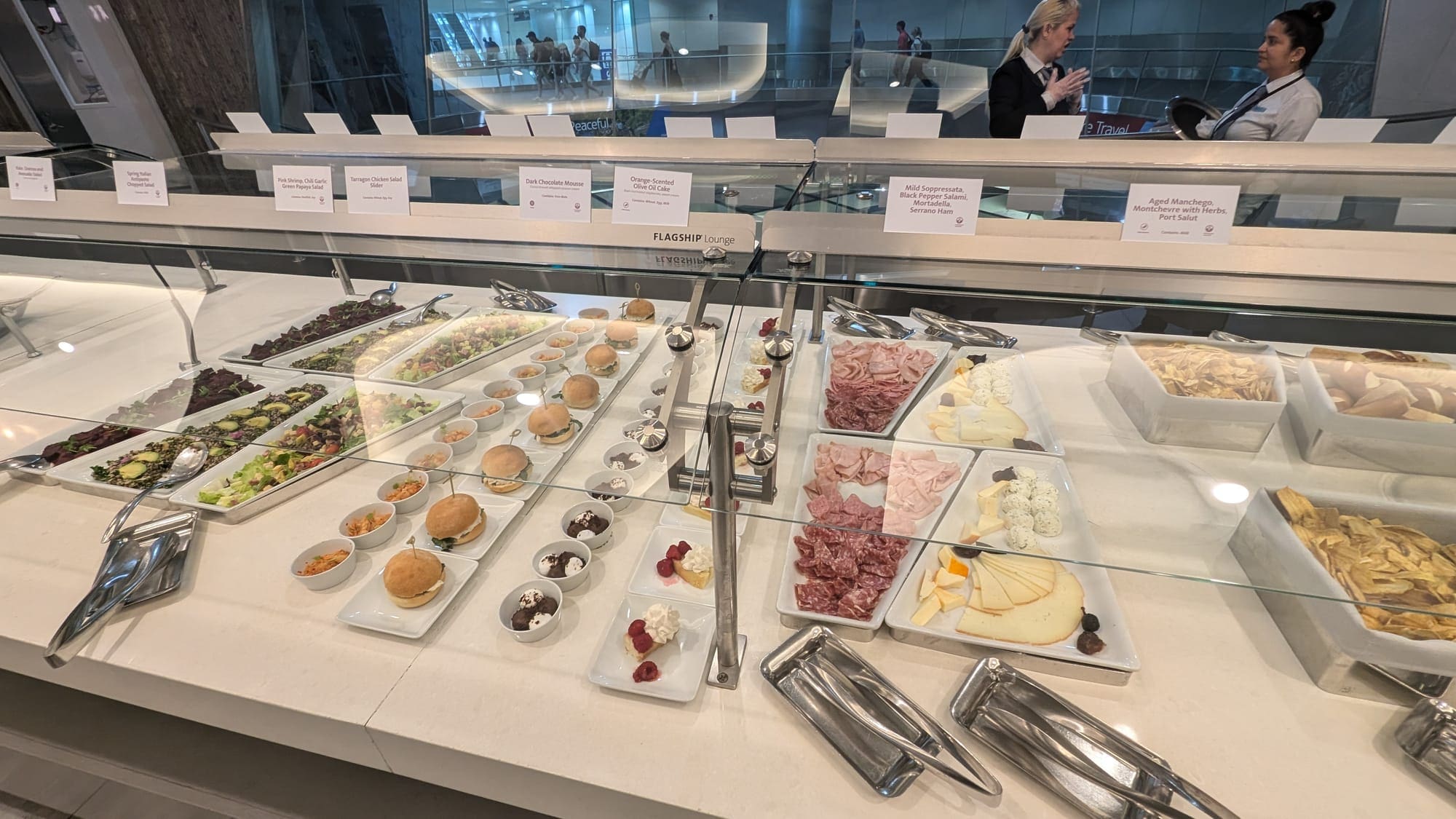 a buffet with different food items on it