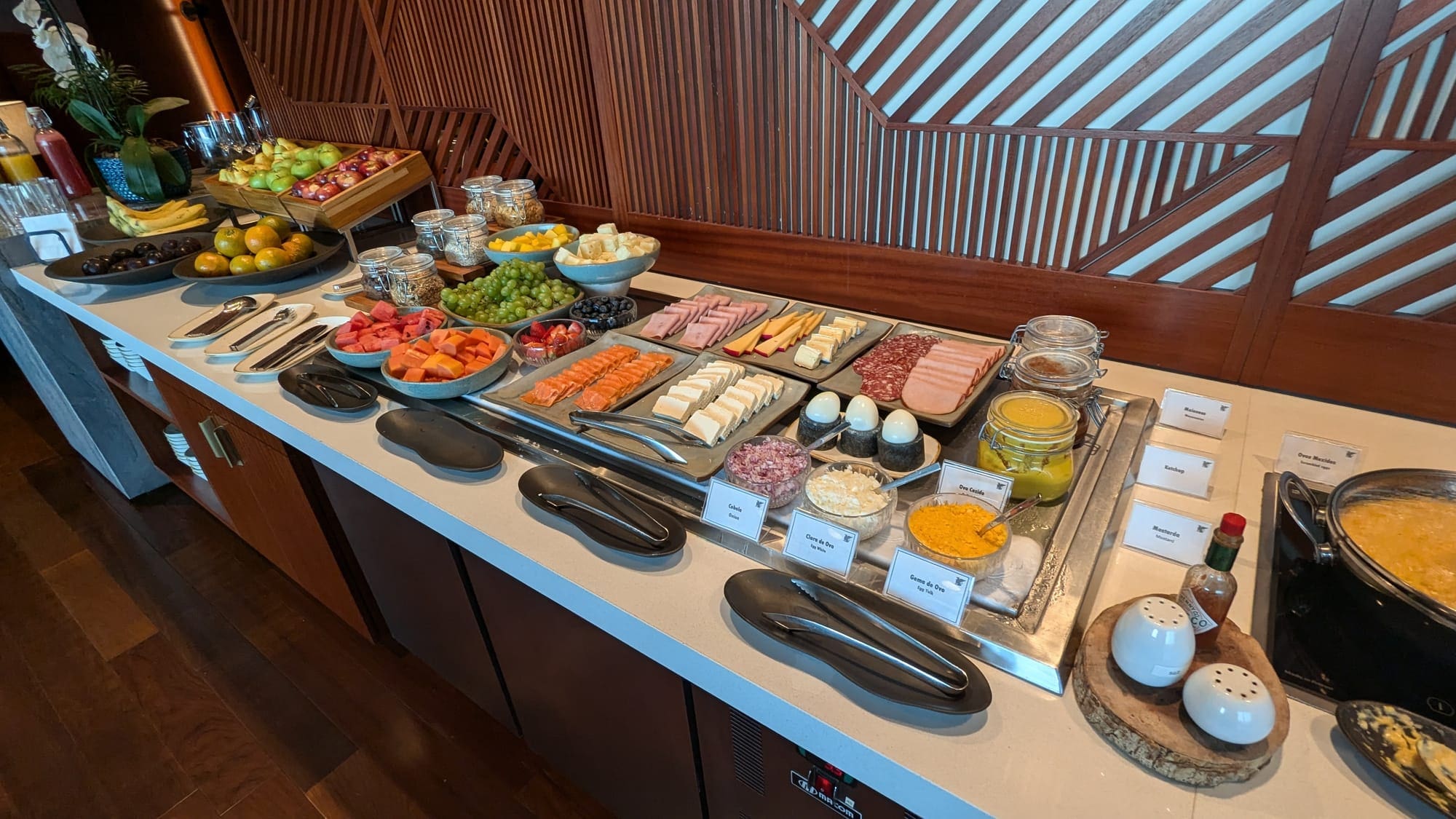 a buffet table with different food items on it