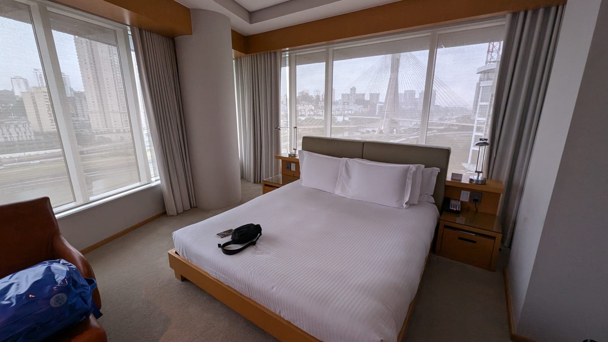 a bed with a bag on it