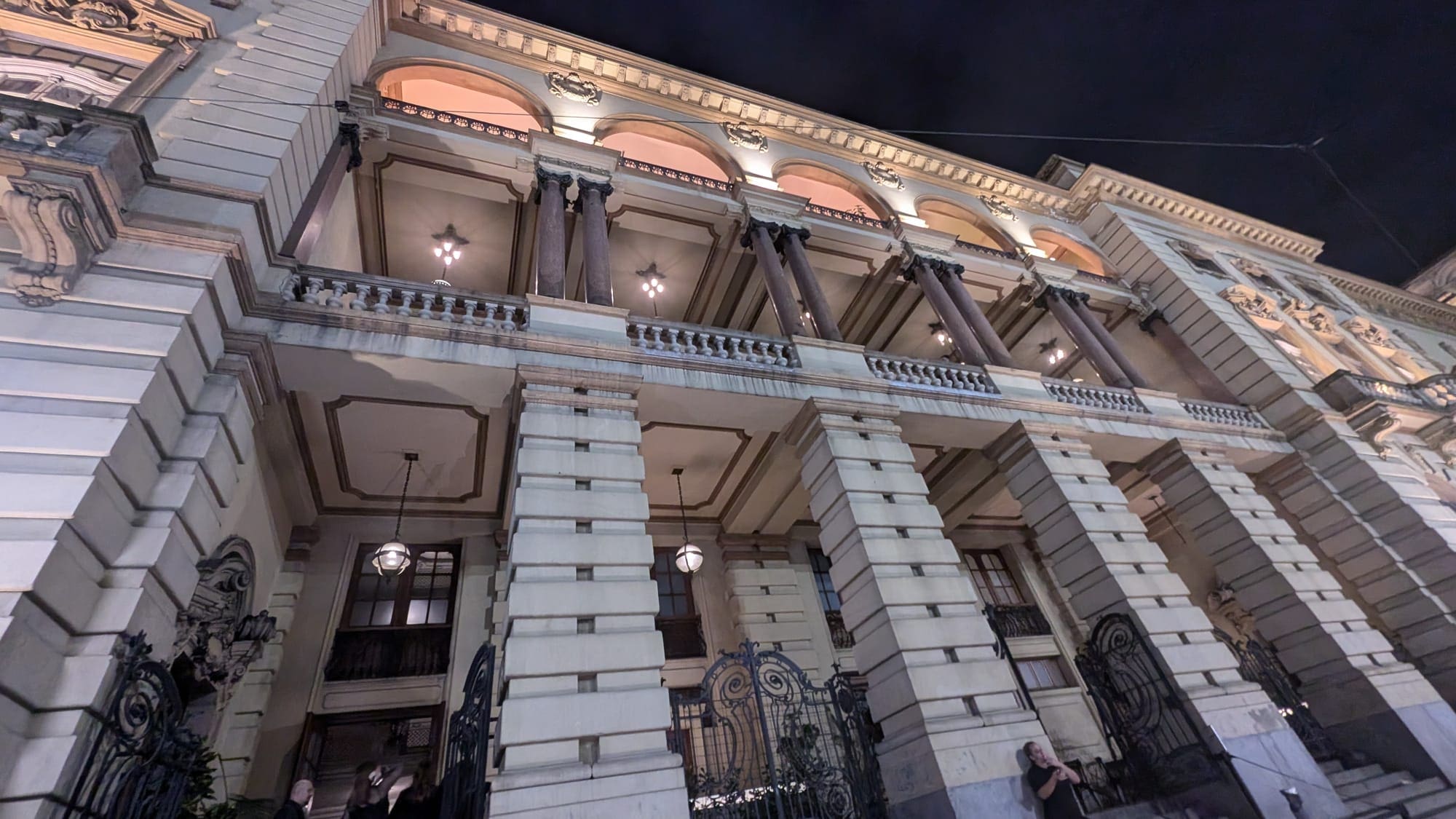 a building with columns and lights