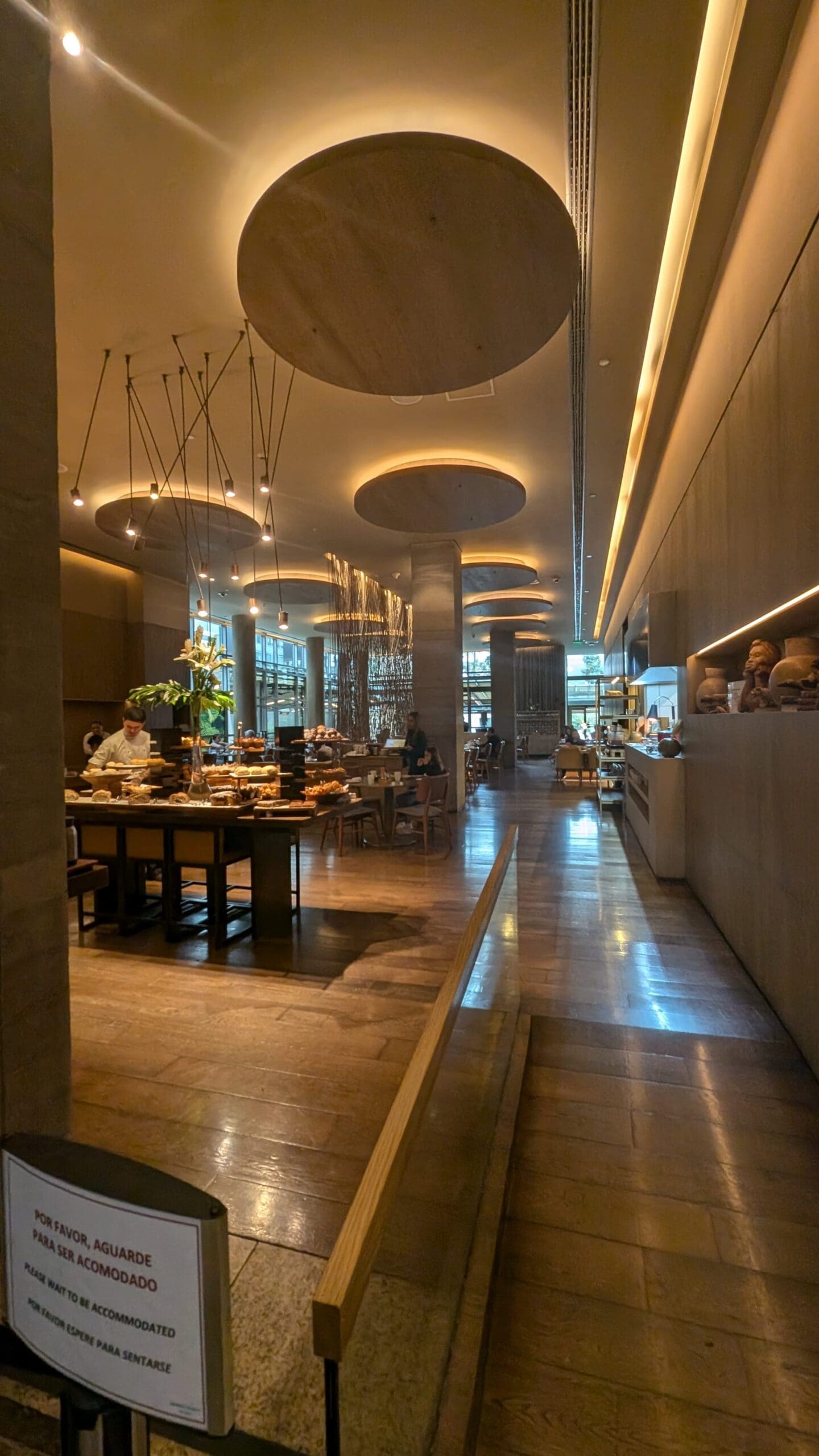 a restaurant with many tables and chairs