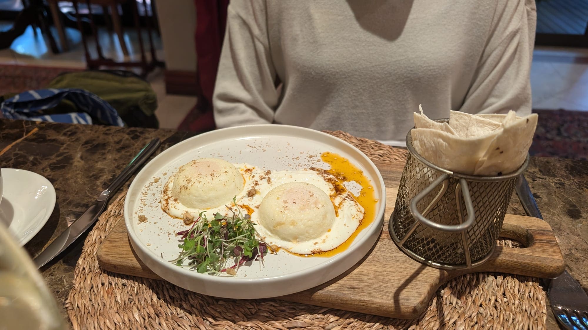 a plate of food on a wooden tray