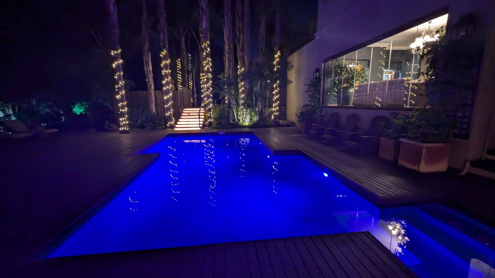 a pool with lights around it