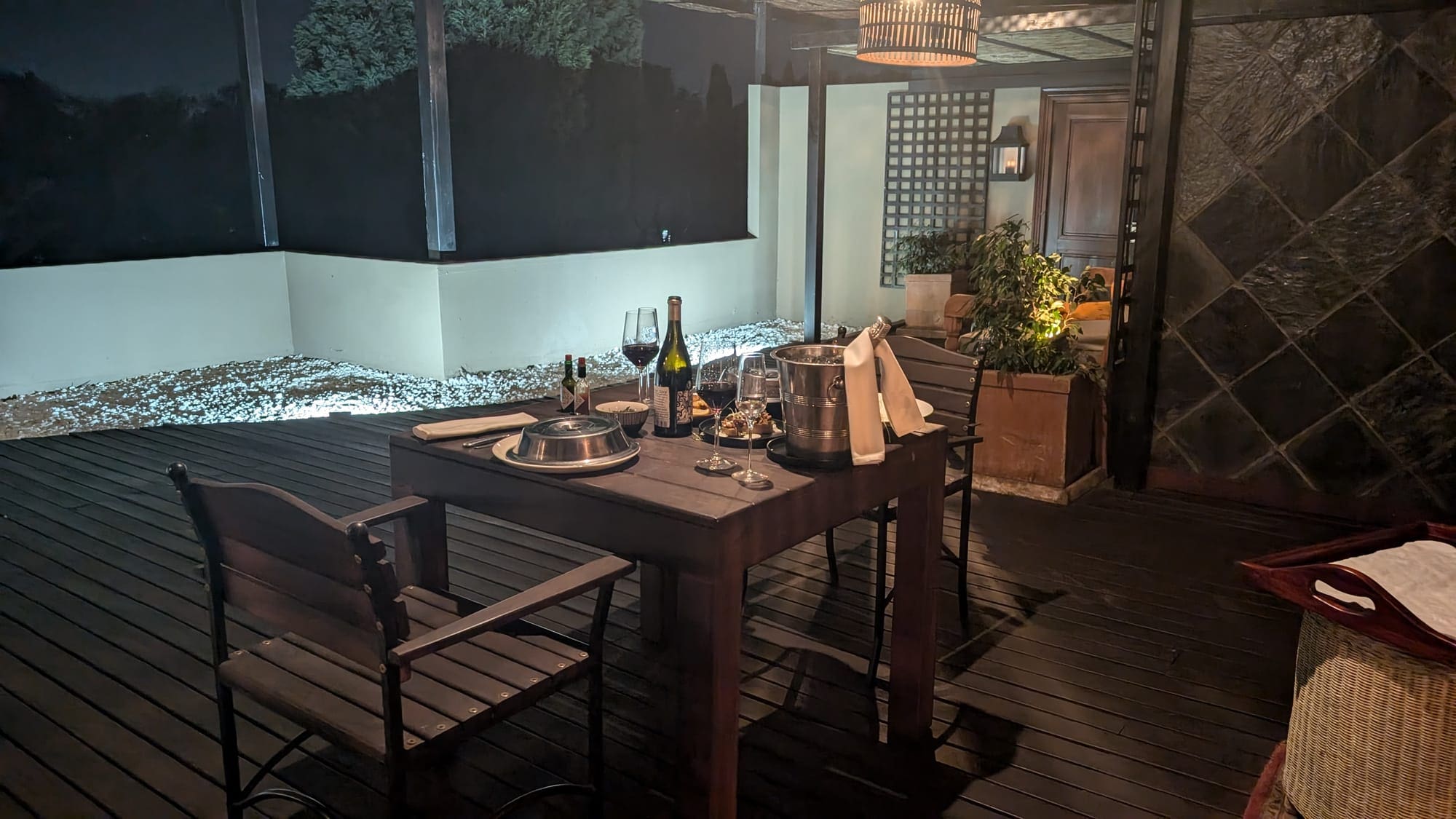 a table with wine and glasses on it