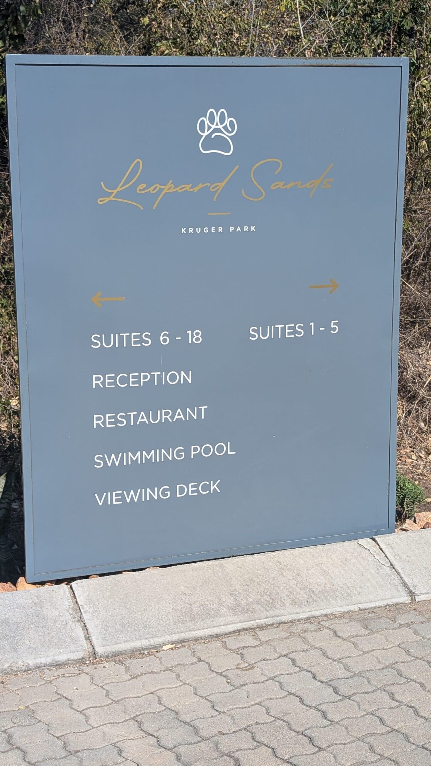 a sign on the sidewalk