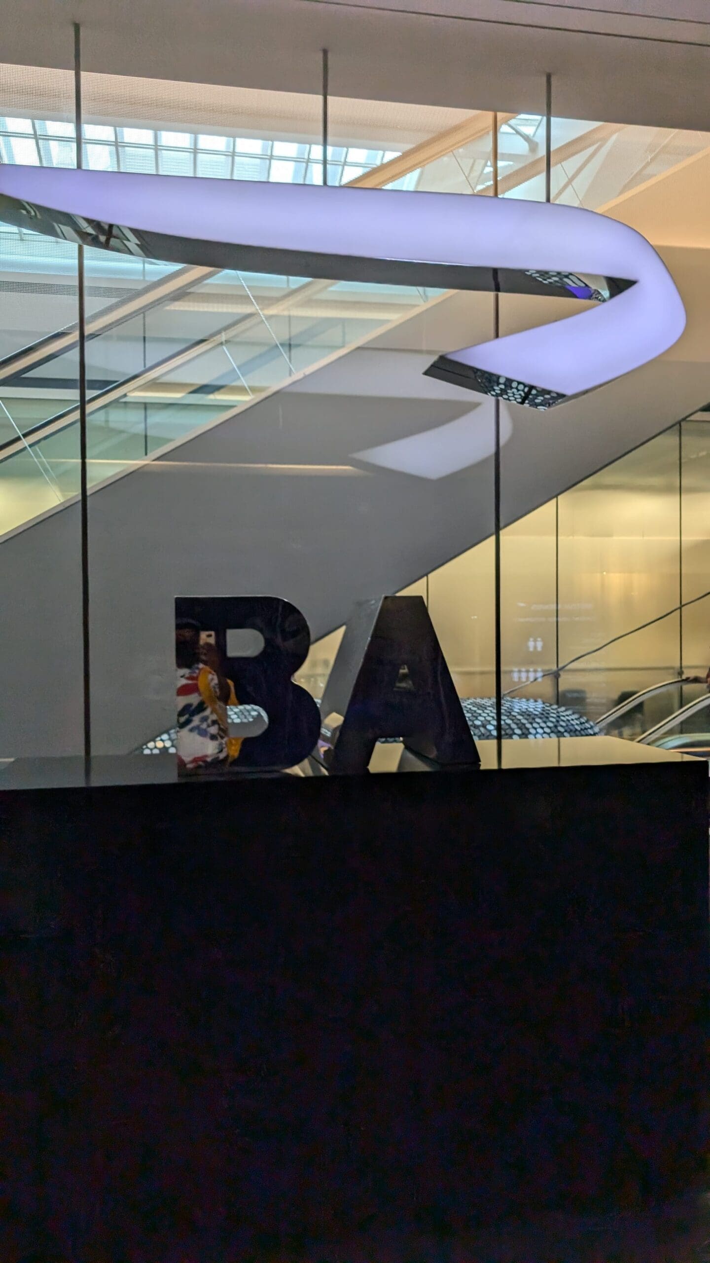a sign in a glass wall