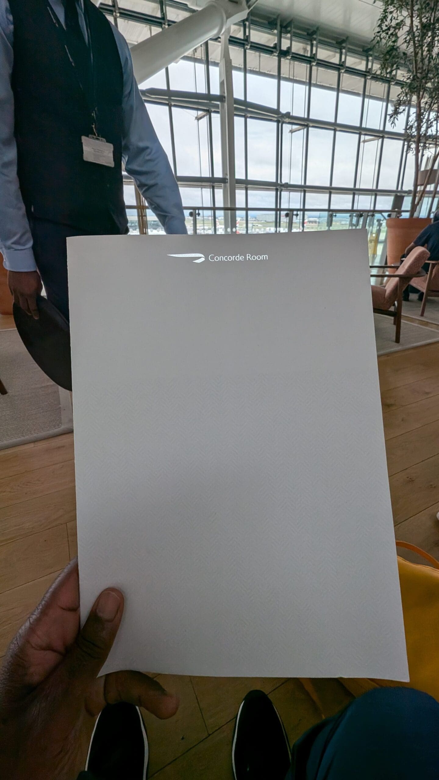 a person holding a piece of paper