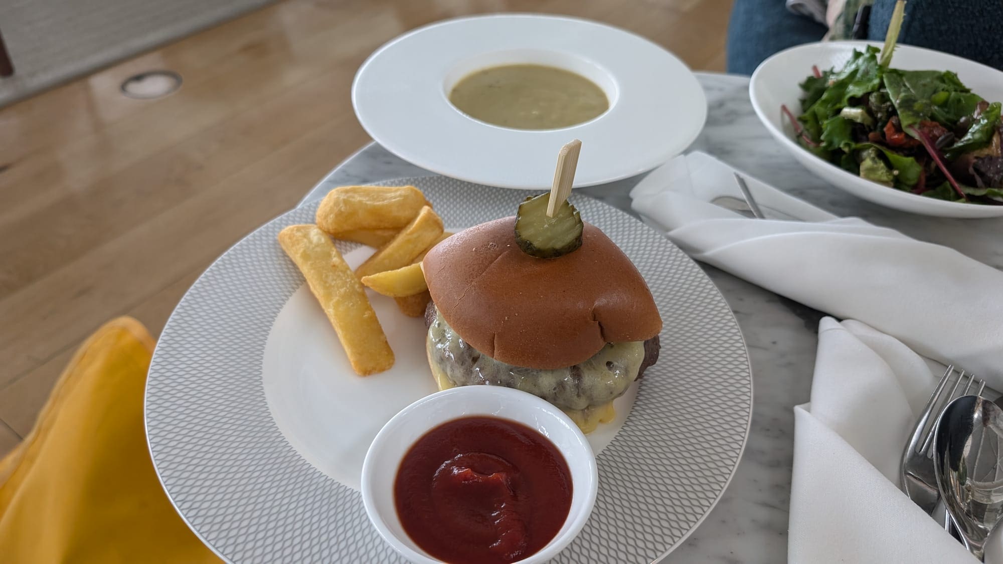 a plate of food with a burger and fries