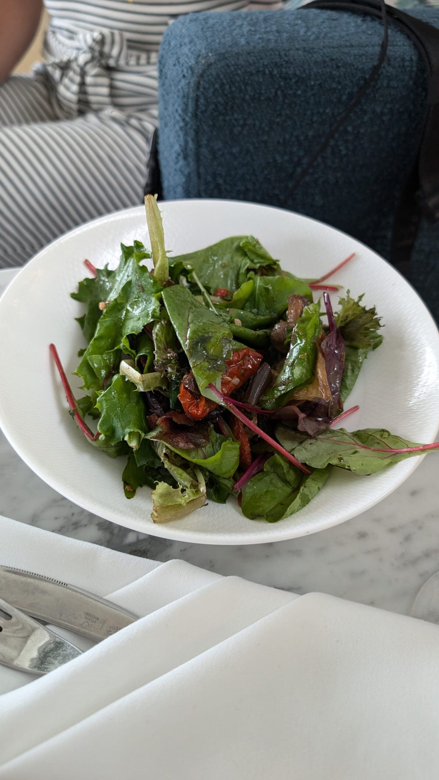 a plate of salad on a table