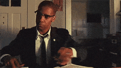 Denzel Washington as Malcom X slamming the table.