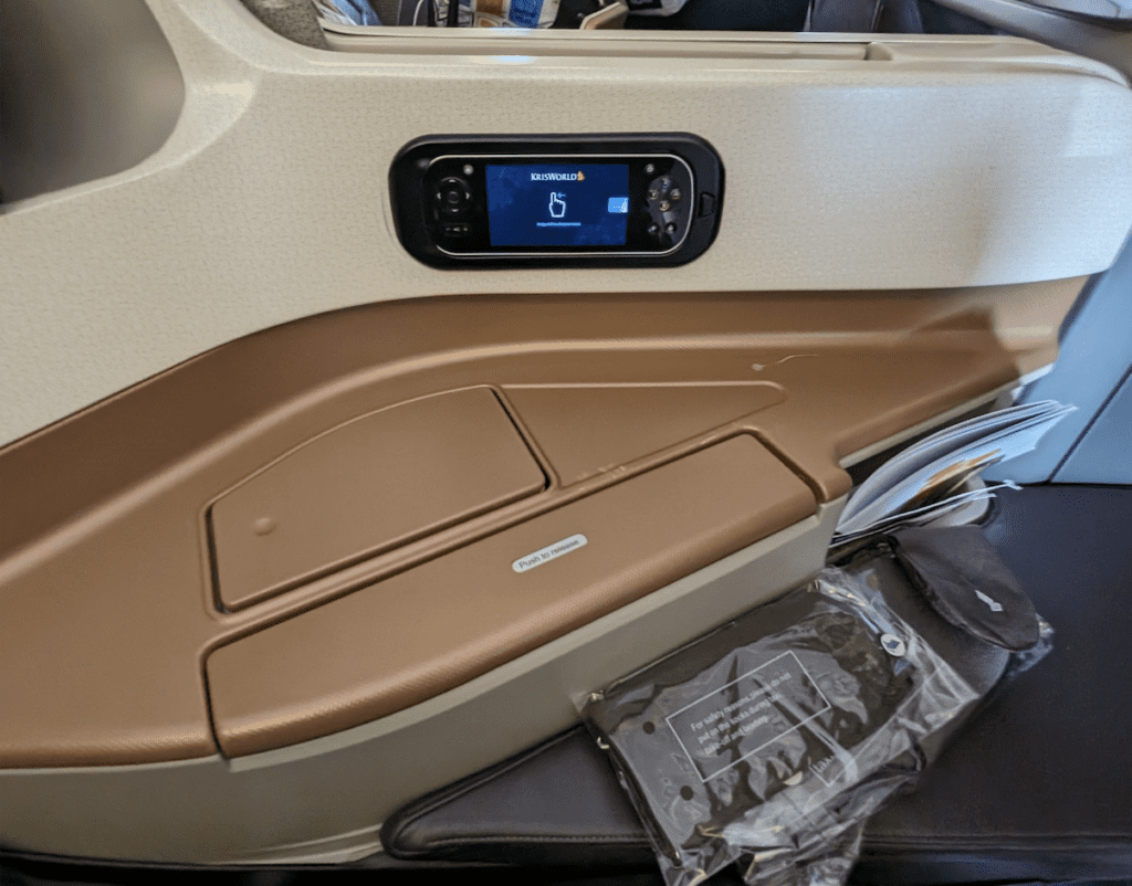 a screen on the side of a seat