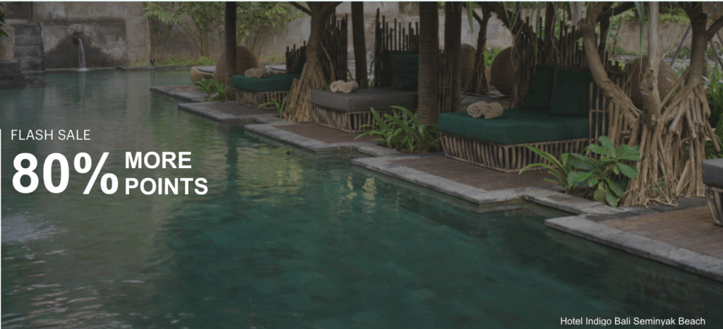 a pool with a pool and lounge chairs