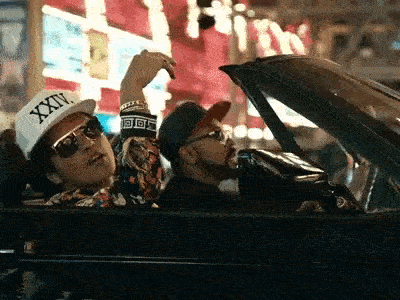 a group of men in a car