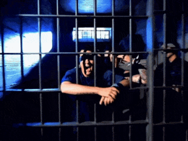 a man in a jail cell