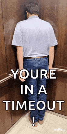 a man standing in a elevator