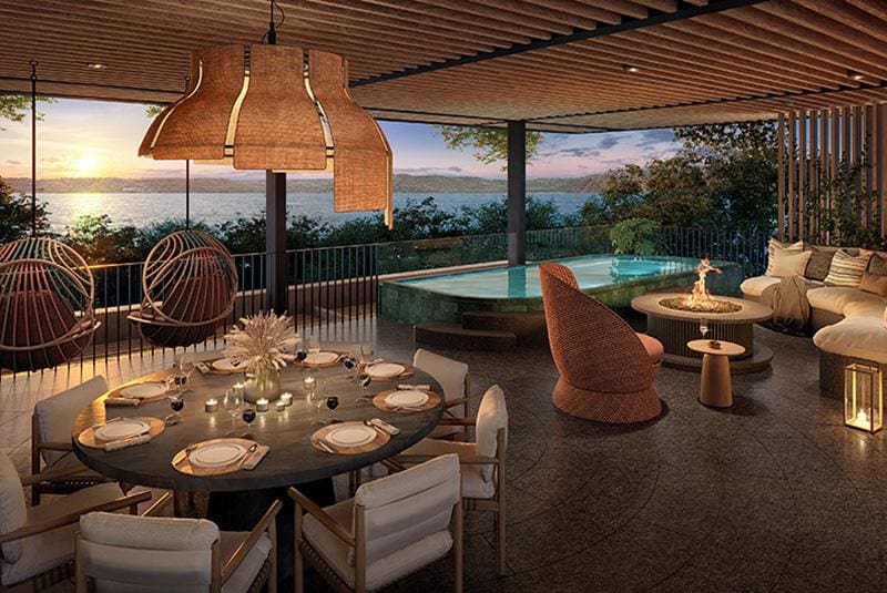 a patio with a pool and a table