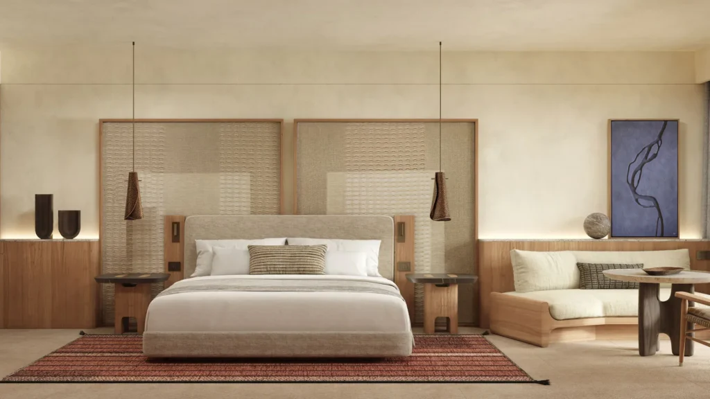 a bedroom with a bed and a couch