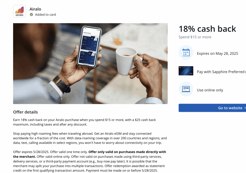 a person holding a phone and a mug of coffee