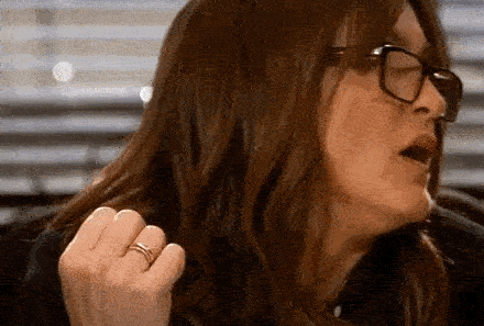a woman with her fist up
