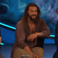 a man sitting on a stage