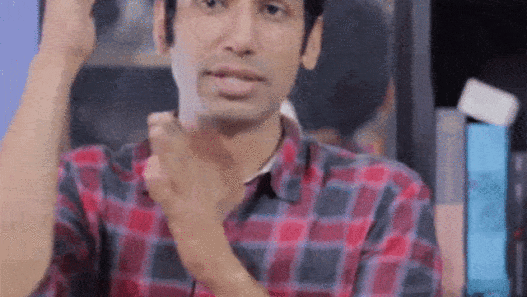 a man raising his hand