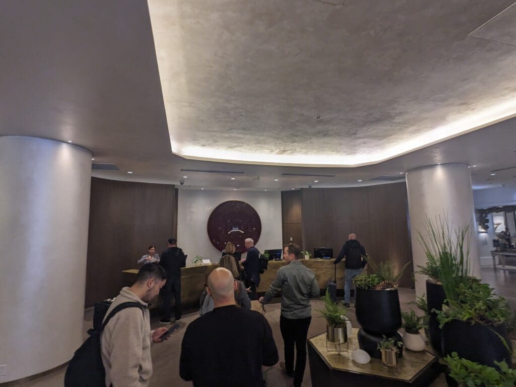 a group of people in a lobby