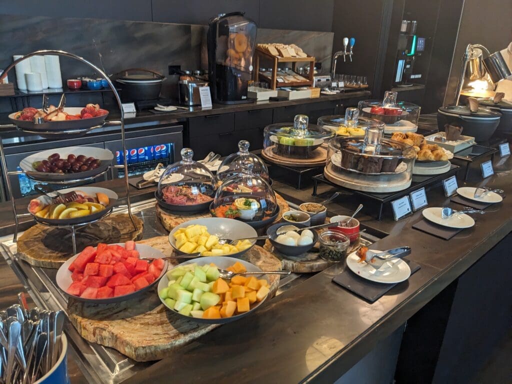 a buffet table with food on plates