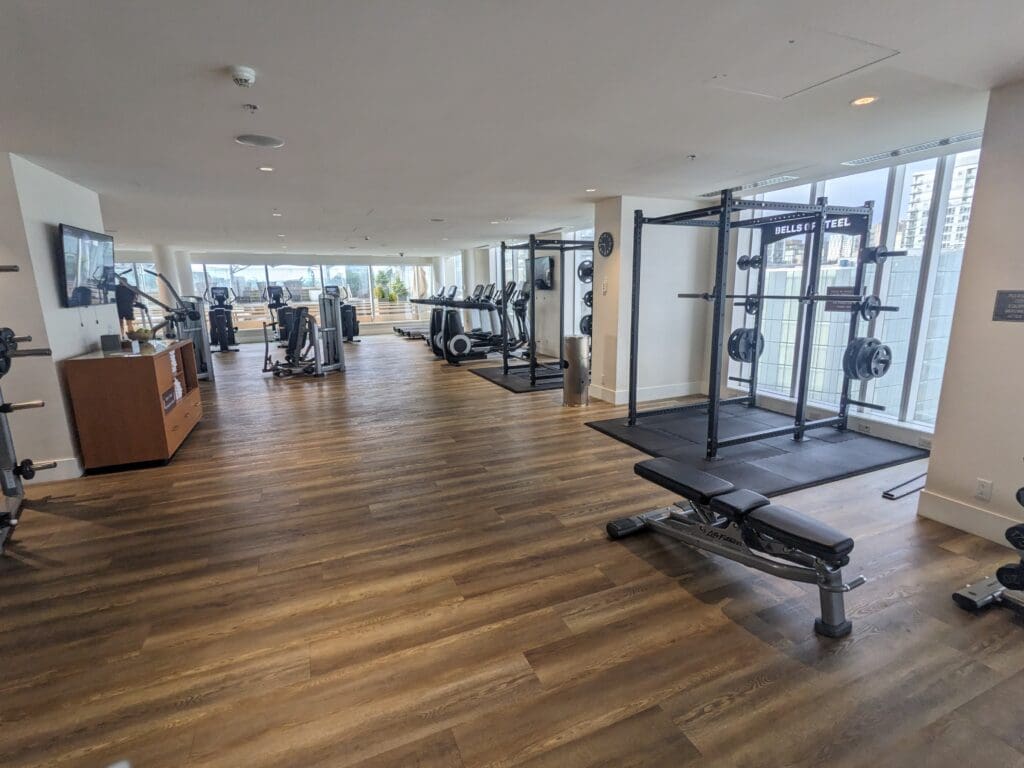 a large room with exercise equipment
