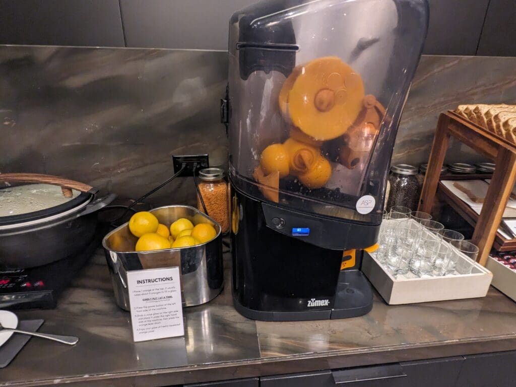 a juicer machine and lemons