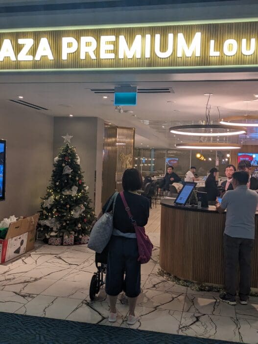 a group of people standing in front of a lobby