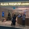 a group of people standing in front of a lobby