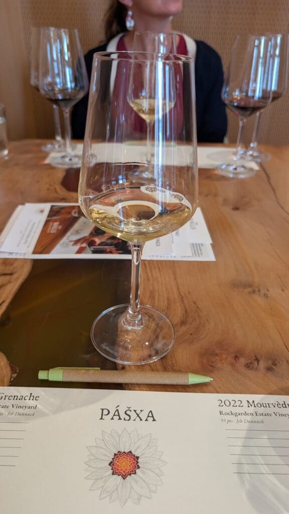 a glass of wine on a table