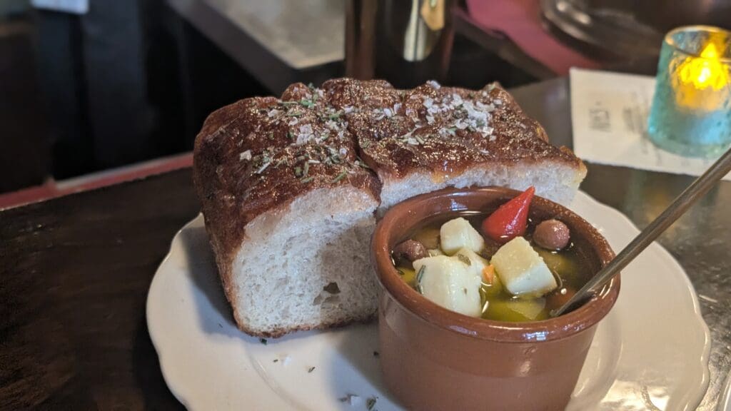 a plate of food with a bowl of soup