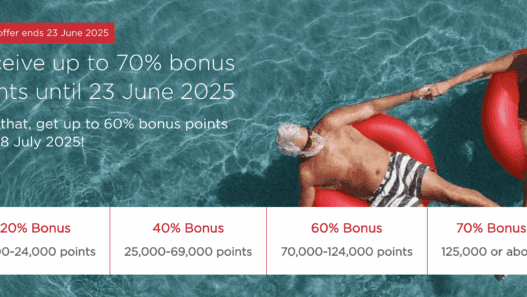 a man floating on a red float in a pool
