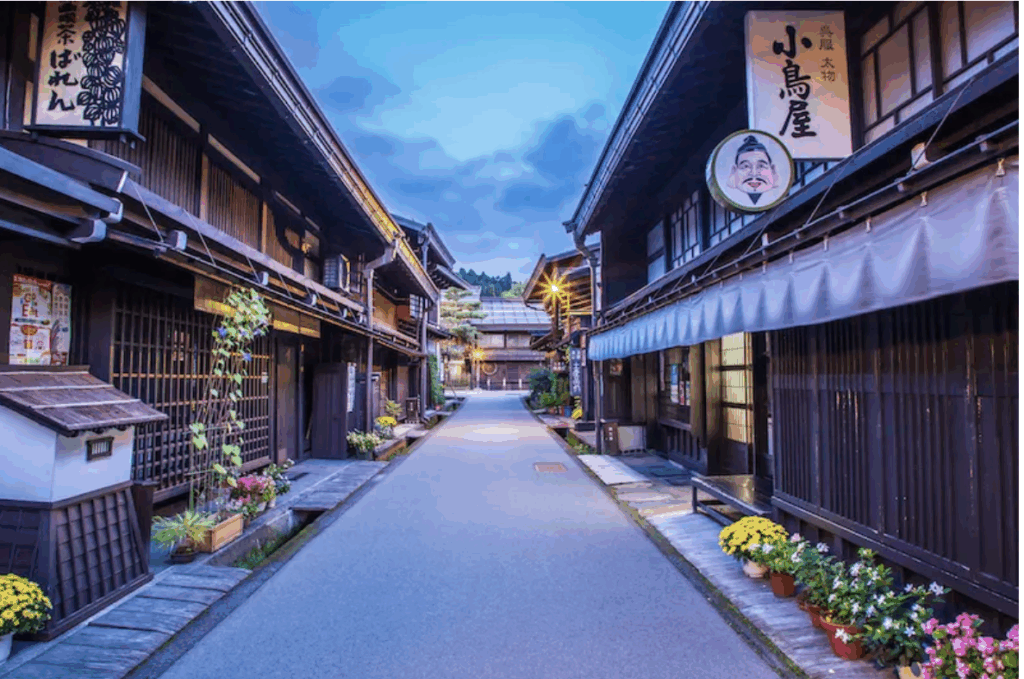 a street with buildings and signs
