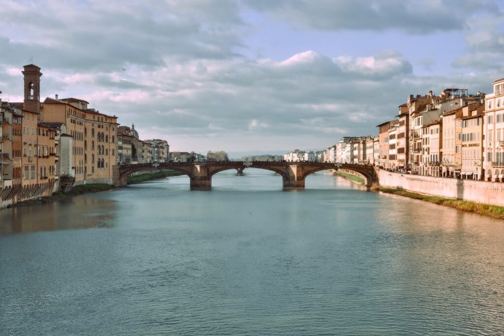 a river with a bridge over it