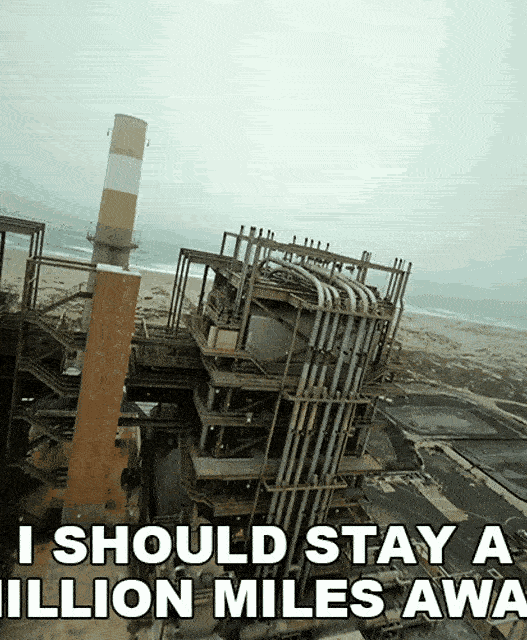 a large metal structure with pipes and a pipe on top