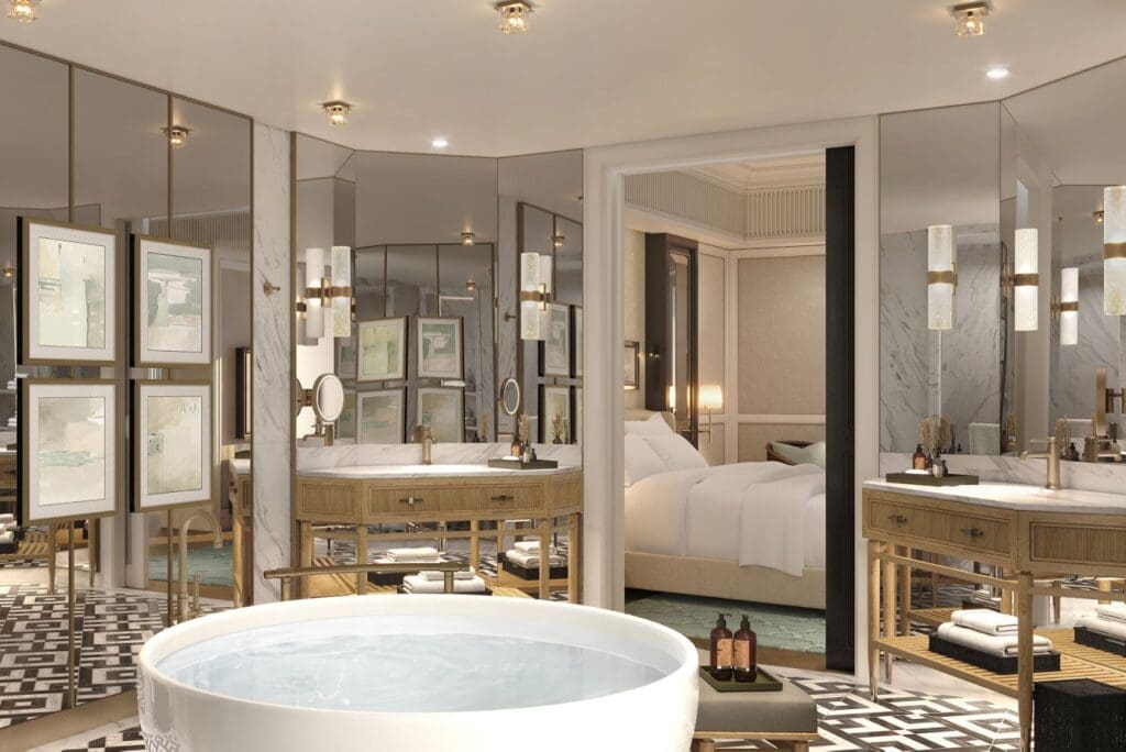 a bathroom with a large tub and a large mirror