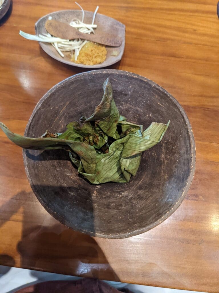 a bowl with leaves on it