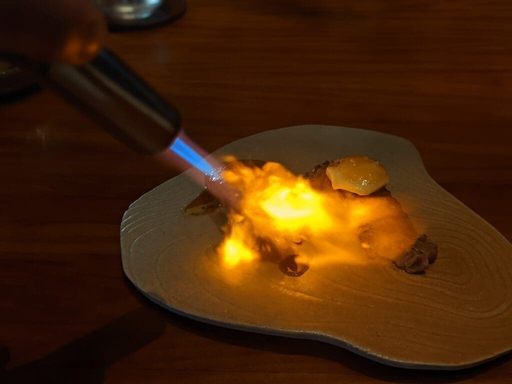 a flame on a plate