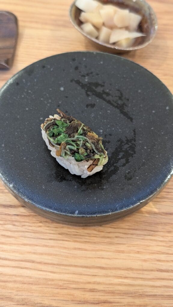 a sushi on a plate