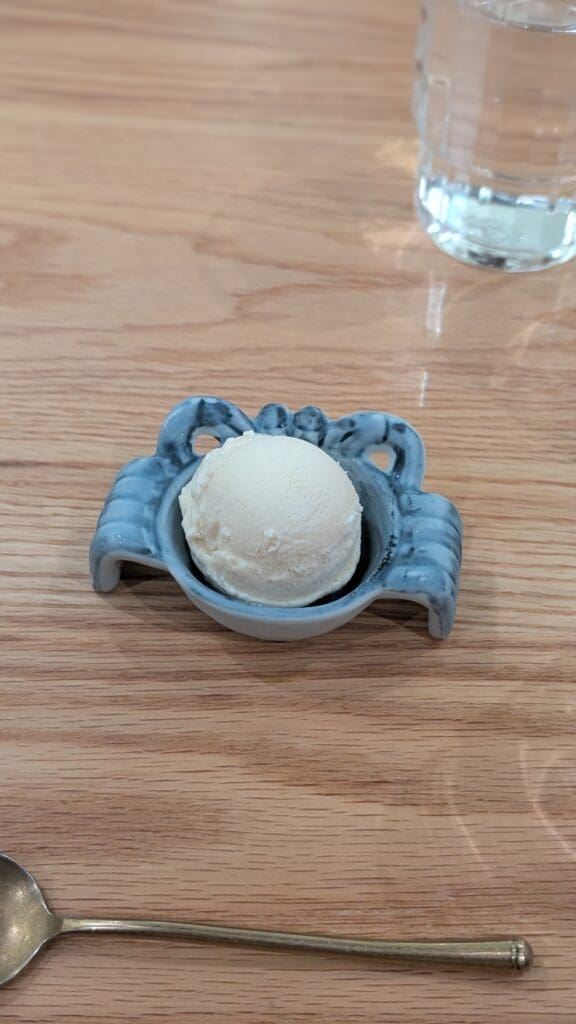 a bowl of ice cream on a table